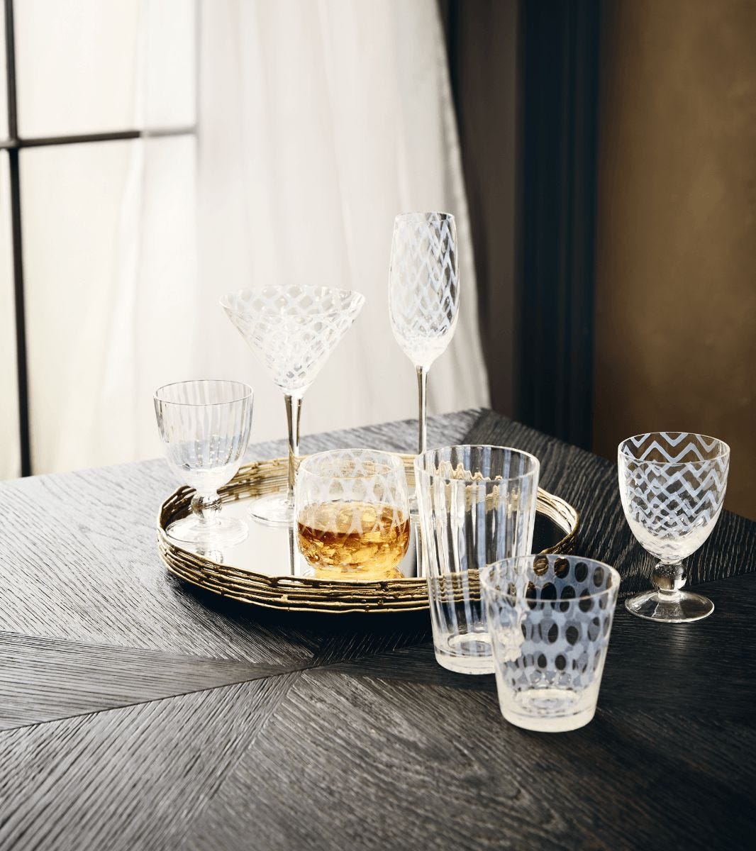 https://www.oka.com/media/catalog/product/4/-/4-pulcinella-champagne-glasses-a15563-1-13-1275-10-11.jpg?quality=80&fit=bounds&height=&width=