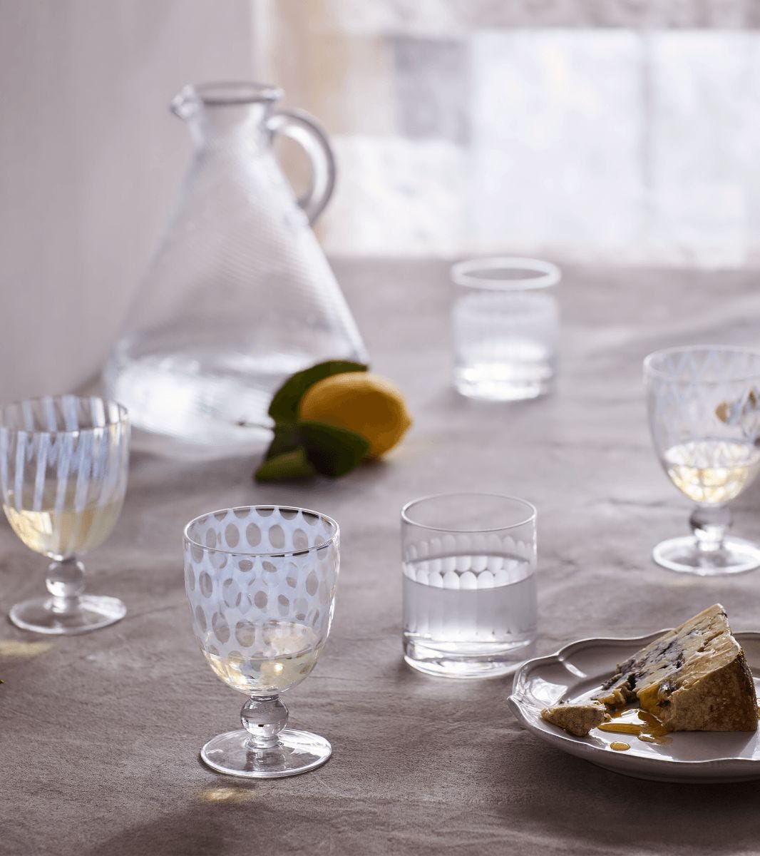 https://www.oka.com/media/catalog/product/p/u/pulcinella-small-wine-glasses-set-of-four-white-a10538-1-13-1275-12-11.jpg?quality=80&fit=bounds&height=&width=