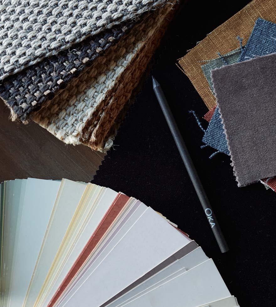 Fabric and colour swatches laid on a table