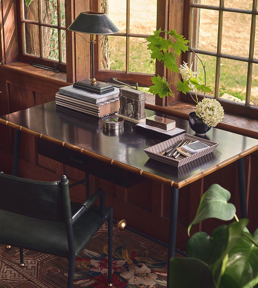 Office with desk, chair and lamp
