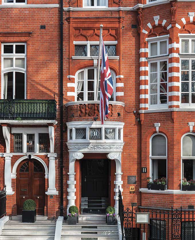 Red brick facade of 11 Cadogan Gardens