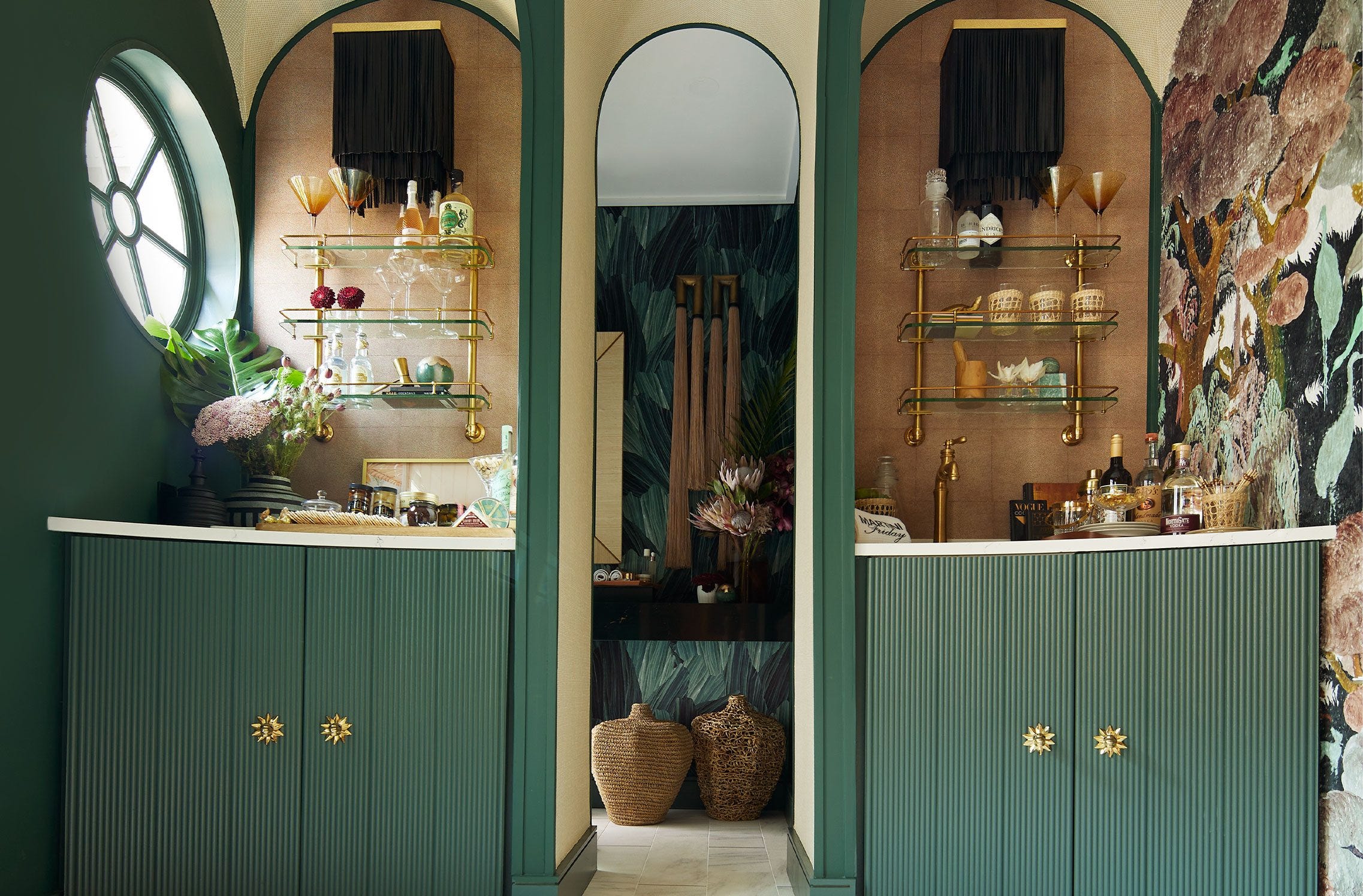 Ornaments and glassware arranged on wooden shelves