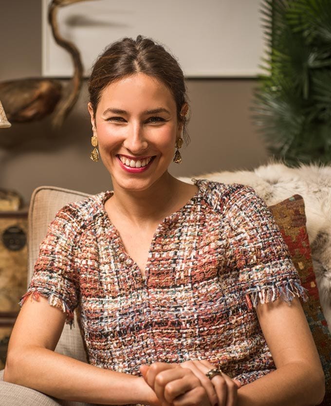 Tessa Packard wearing a tweed top