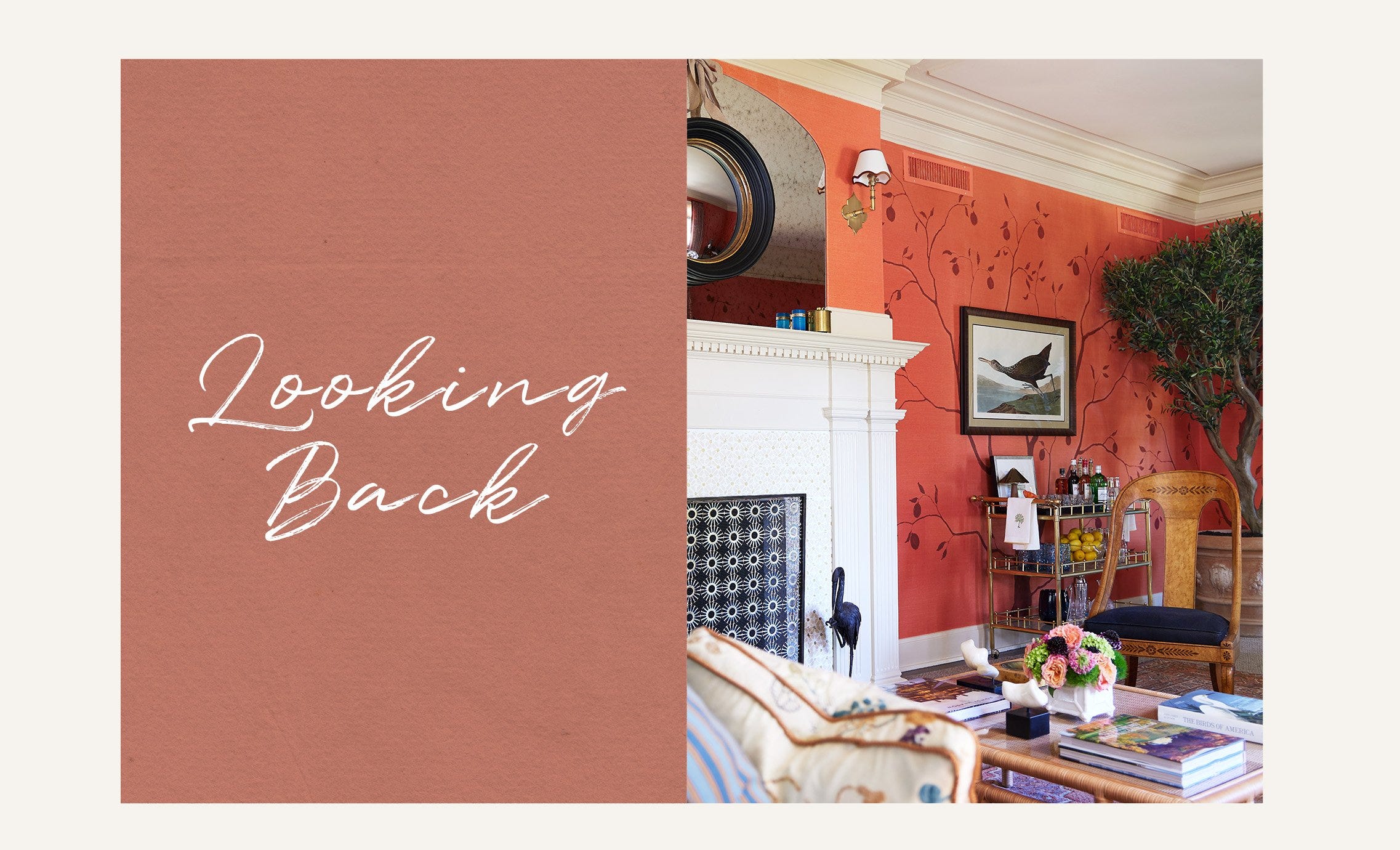 A sitting room setting with red, floral wallpaper, rattan chairs and a bar trolley. Next to the image is a sub header that reads "Looking Back"