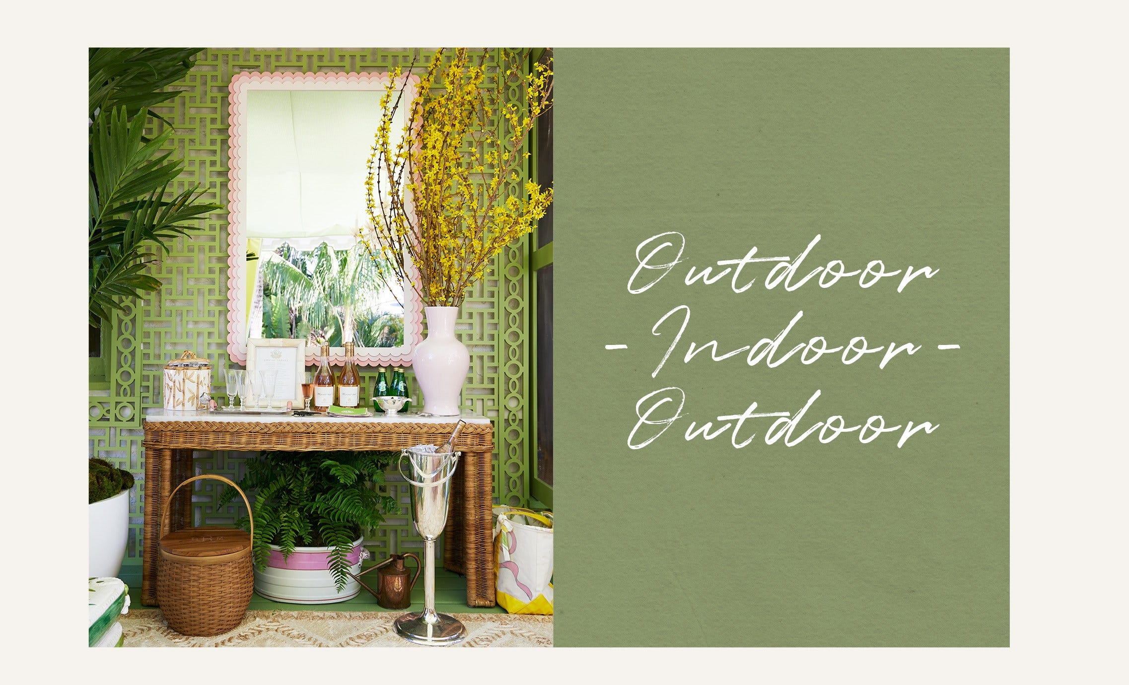 A console table sits against a green wall, decorated with bottles of champagne, glassware and a large white vase with white flowers. Next to the image is a sub header that reads "Outdoor-Indoor-Outdoor"